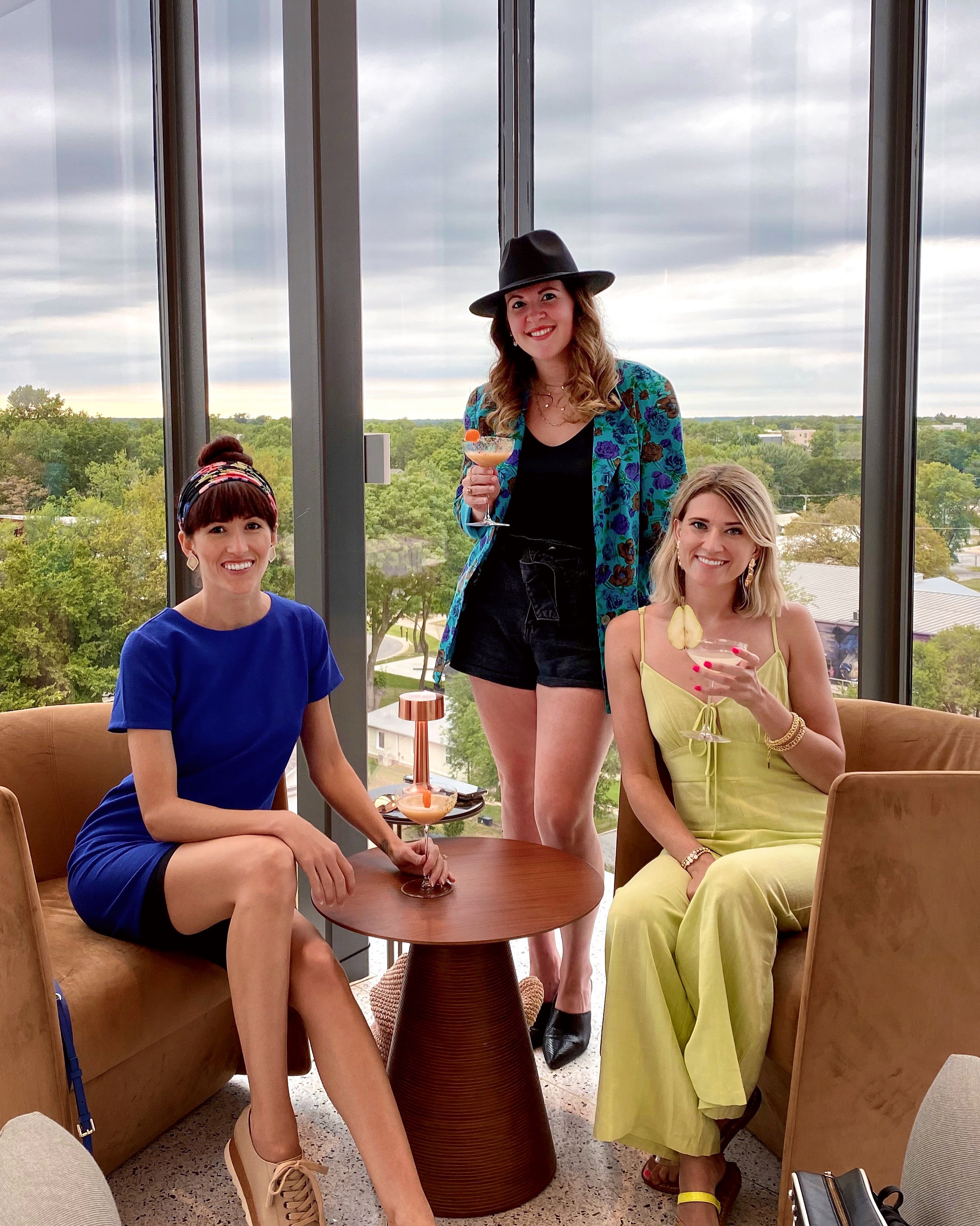 Alyssa Bird with her friends at the Momentary Art Museum roof top bar in Bentonville, AR