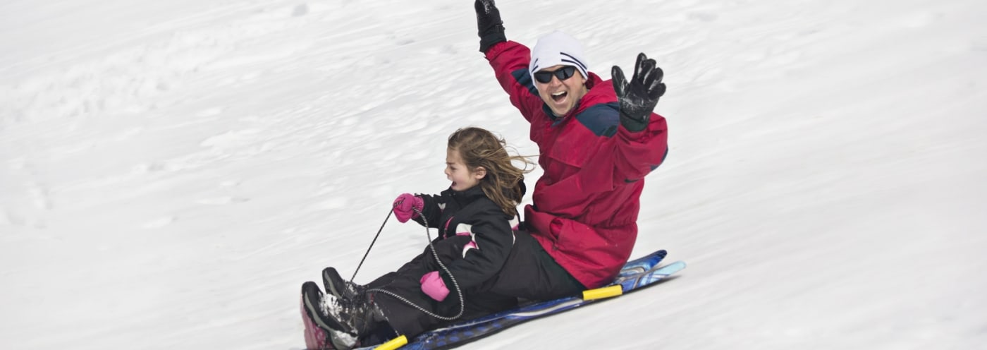 father-and-daughter-sledding