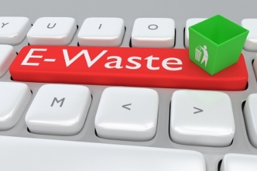 Computer Keyboard with a button for E-Waste and a recycler bin