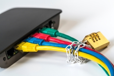 Cables coming out of a router chained together