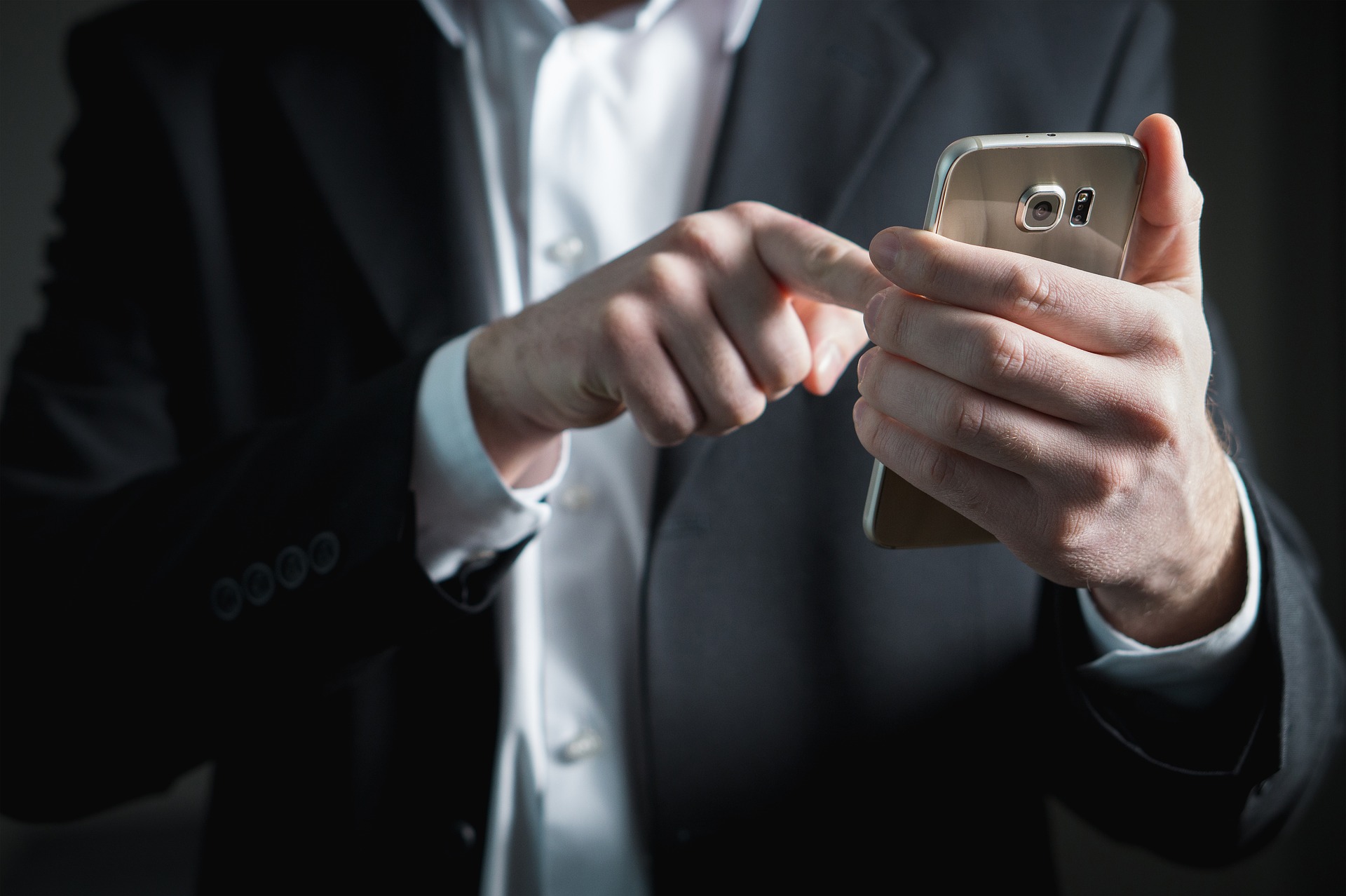 business man with smartphone in the hand
