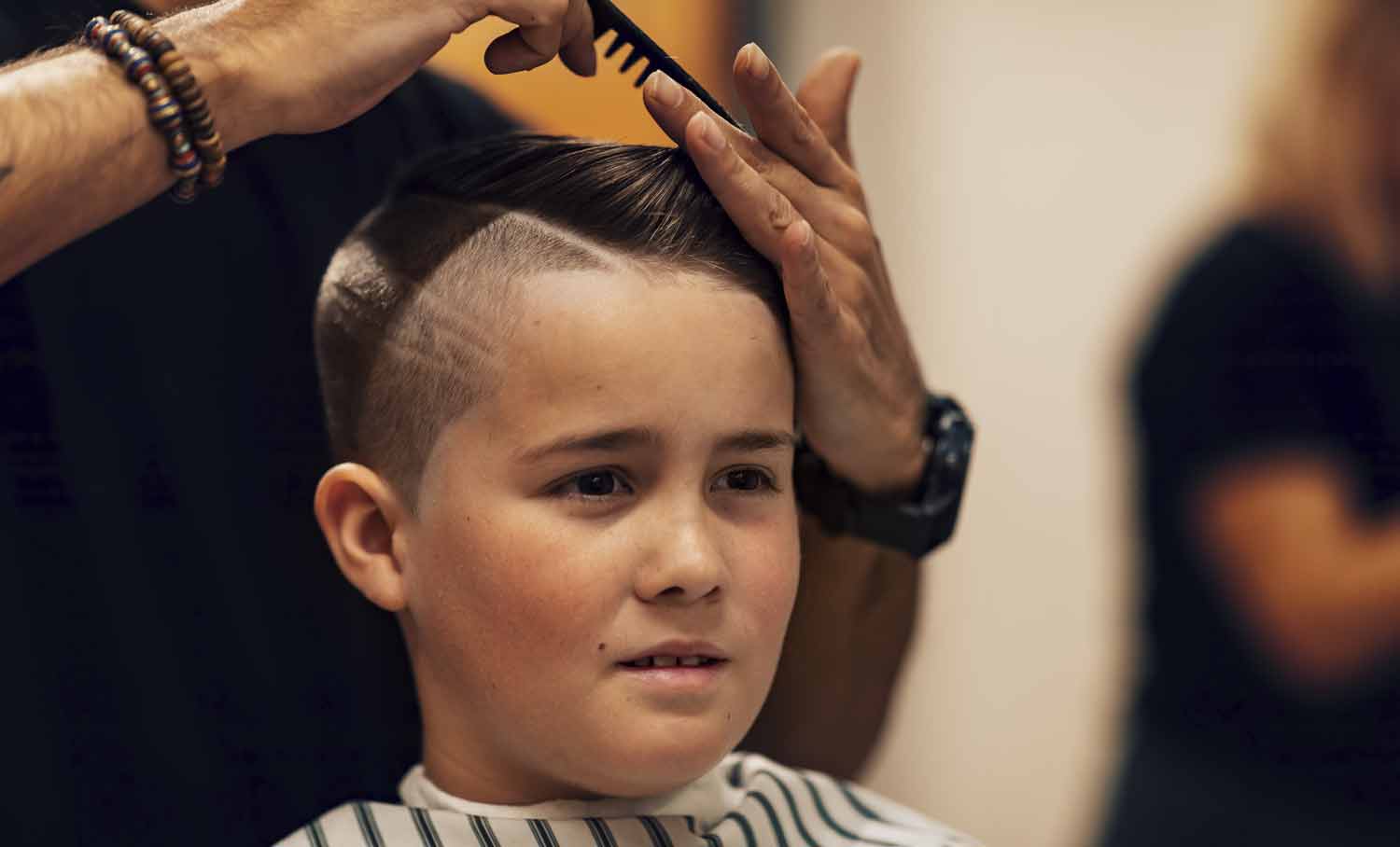 Barber Styling Young Boys Hair, The final touches.