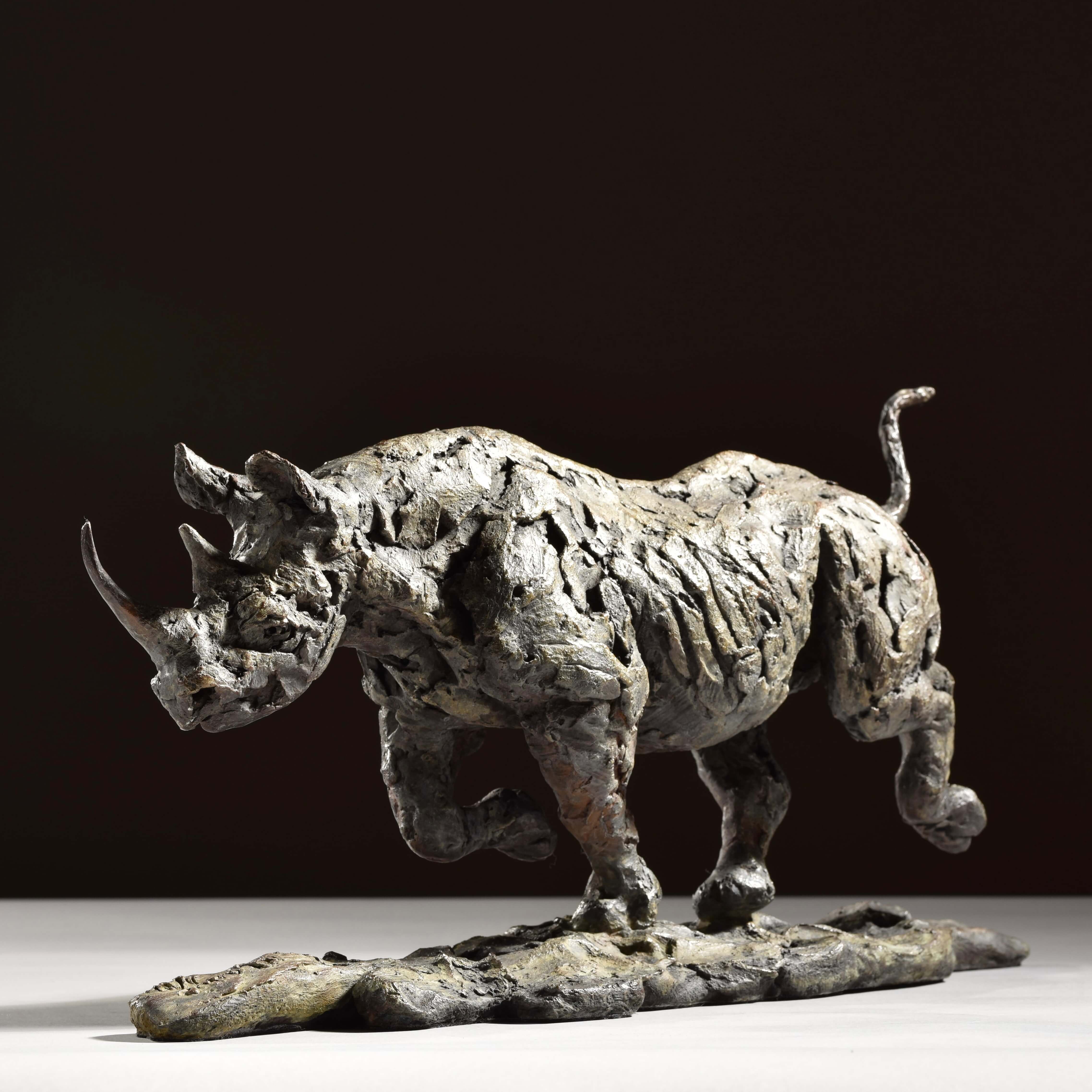 Black Rhino Running by Hamish Mackie at Muse. The Sculpture Company