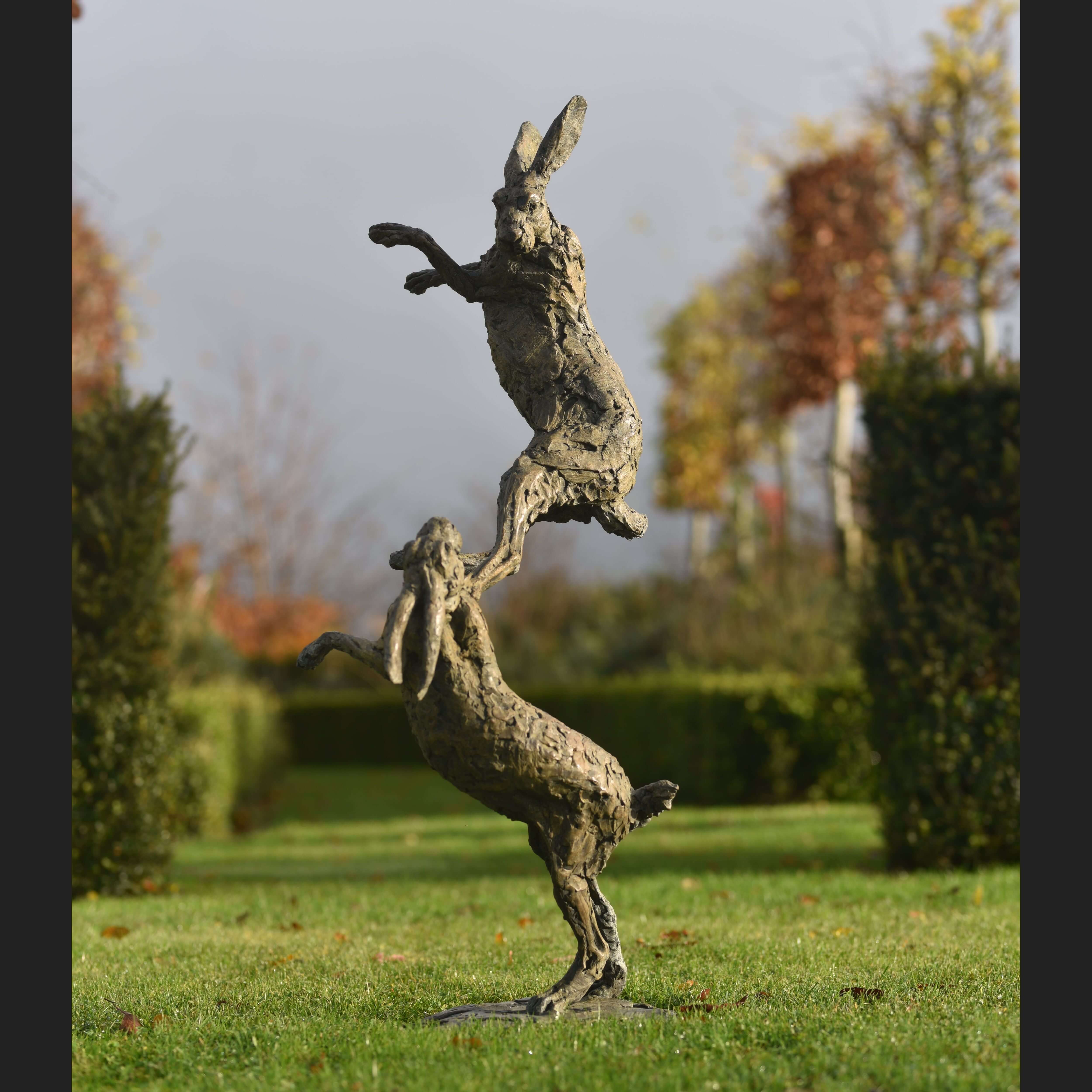 Hares Boxing by Hamish Mackie at Muse. The Sculpture Company