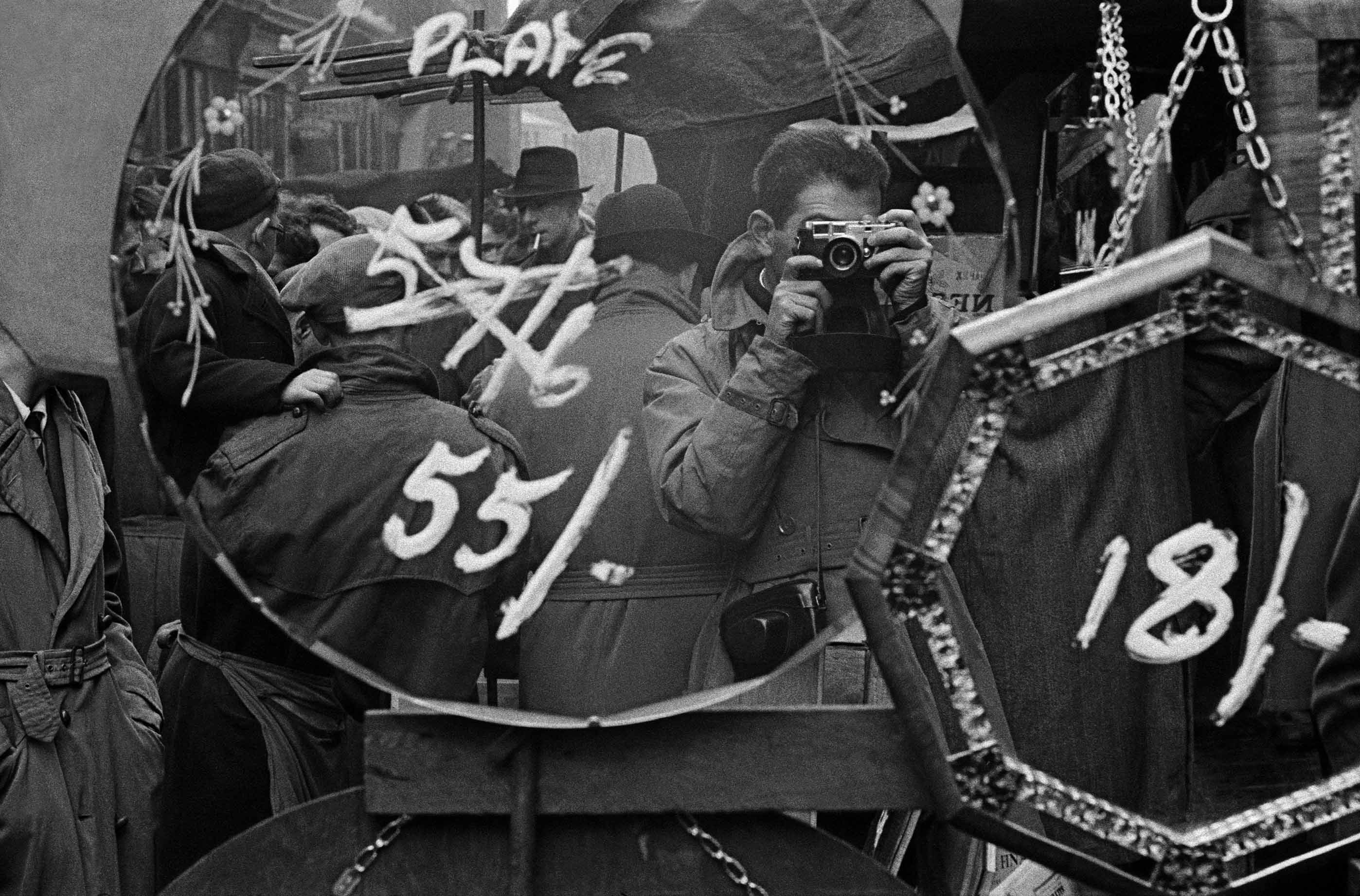 1955, London, UK, self-portrait in Brick Lane market, Courtesy of the artist
