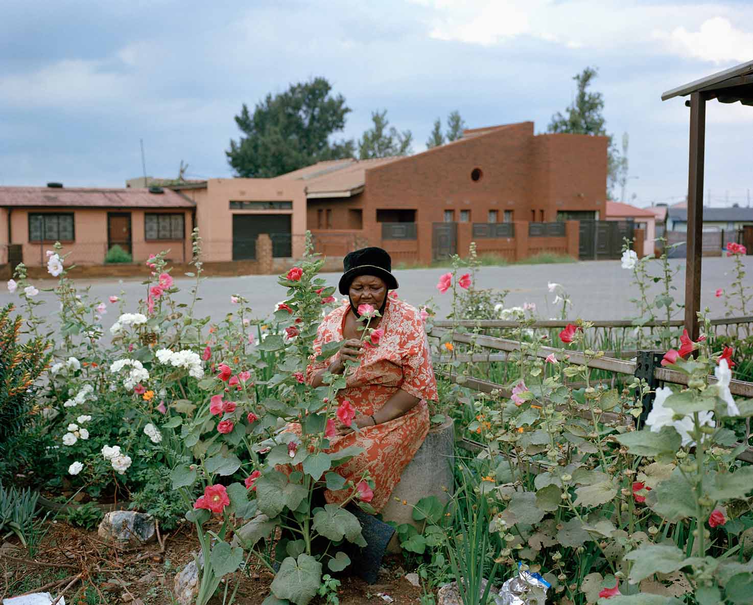 Lindokuhle Sobekwa-Gogo Lucy Zwane in her garden-Johannesburg, Thokoza, South Africa 2021- From the senes szilalini (lhe Country)