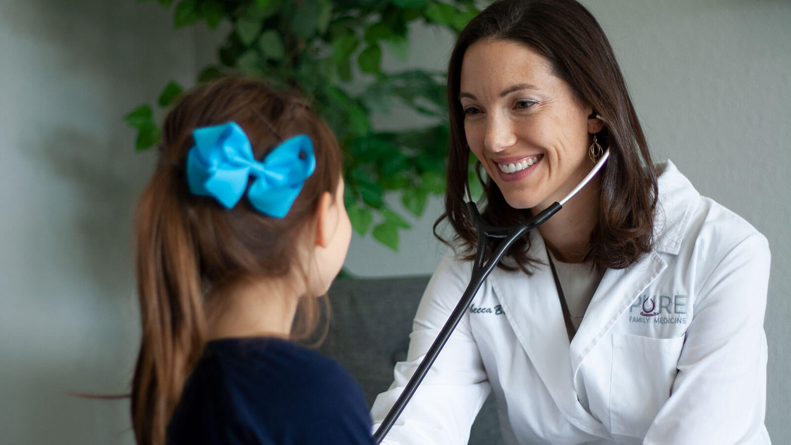 Dr. Rebecca Bub caring for a patient