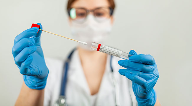 female doctor running a covid-19 test