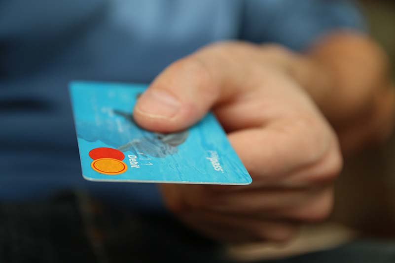 paying for healthcare with cash and credit card