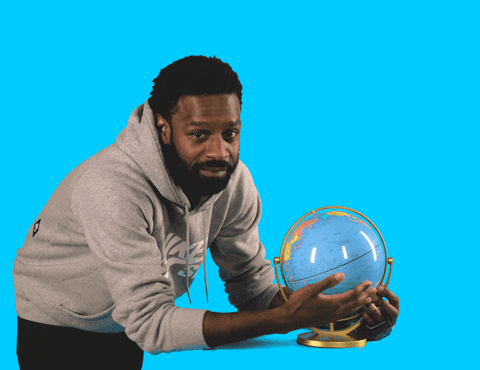 GIF of a person spinning a globe and saying "Everyone is welcome."