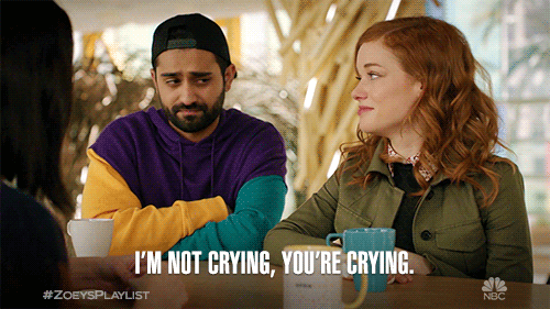 GIF of a person saying to their friend "I'm not crying, you're crying."