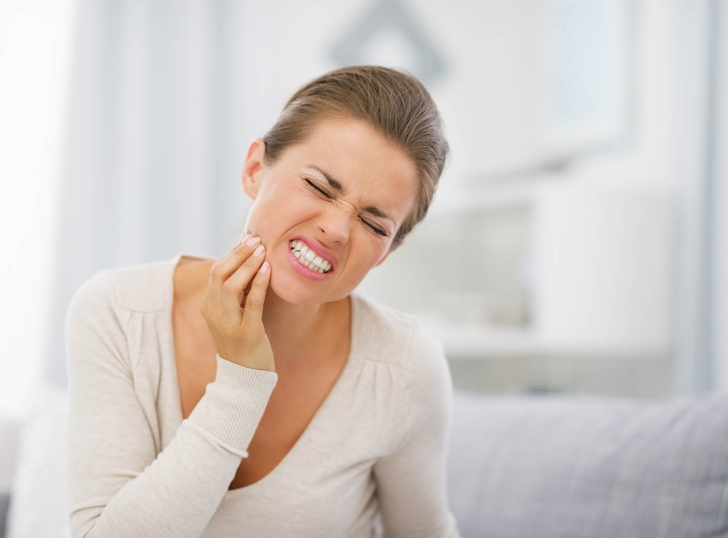 Female with tooth pain