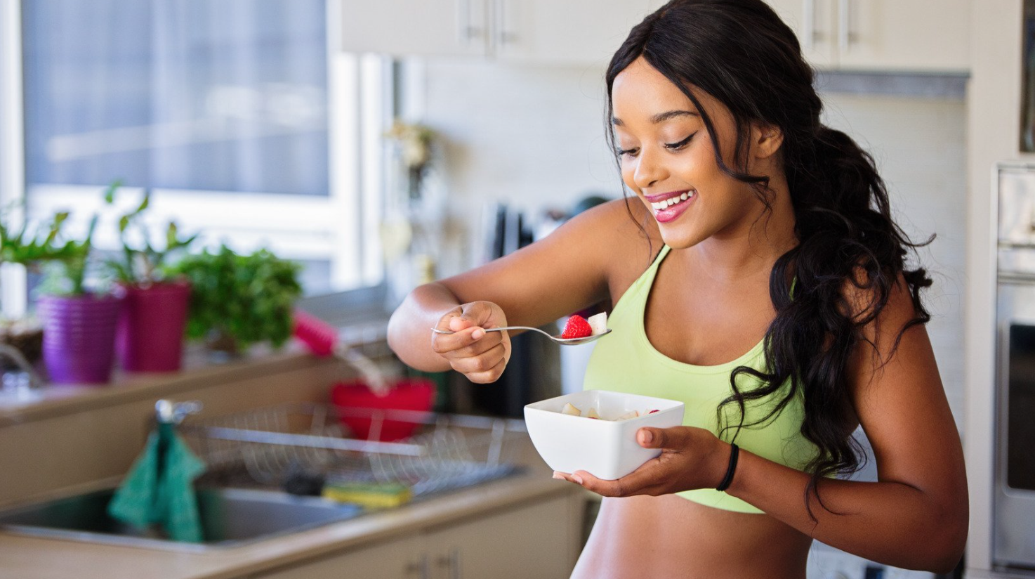 woman eating fruit