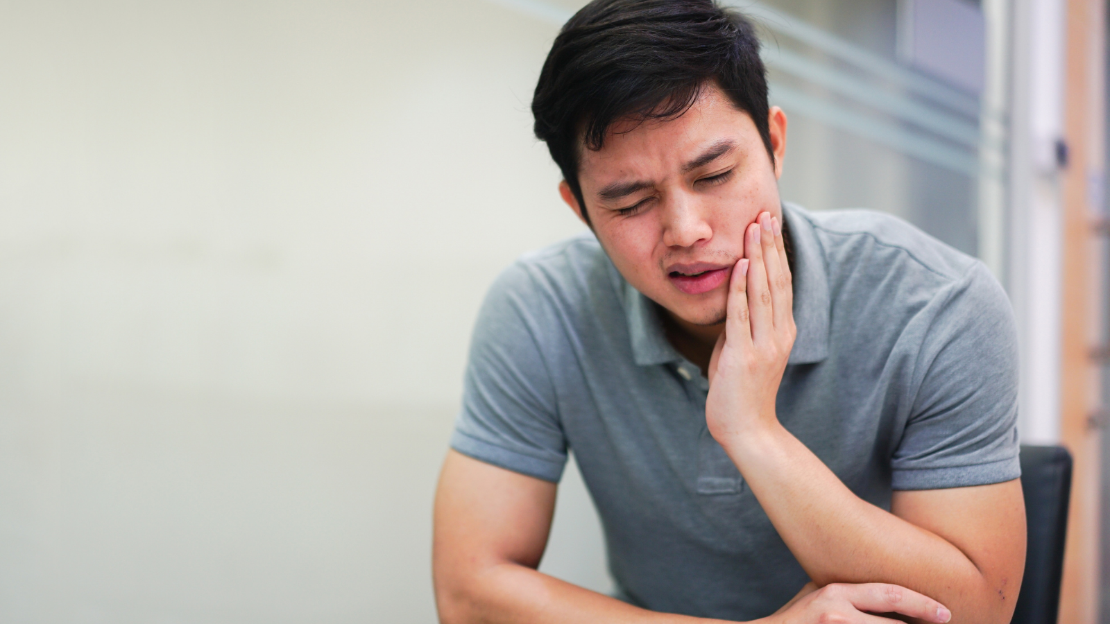 man with tooth pain