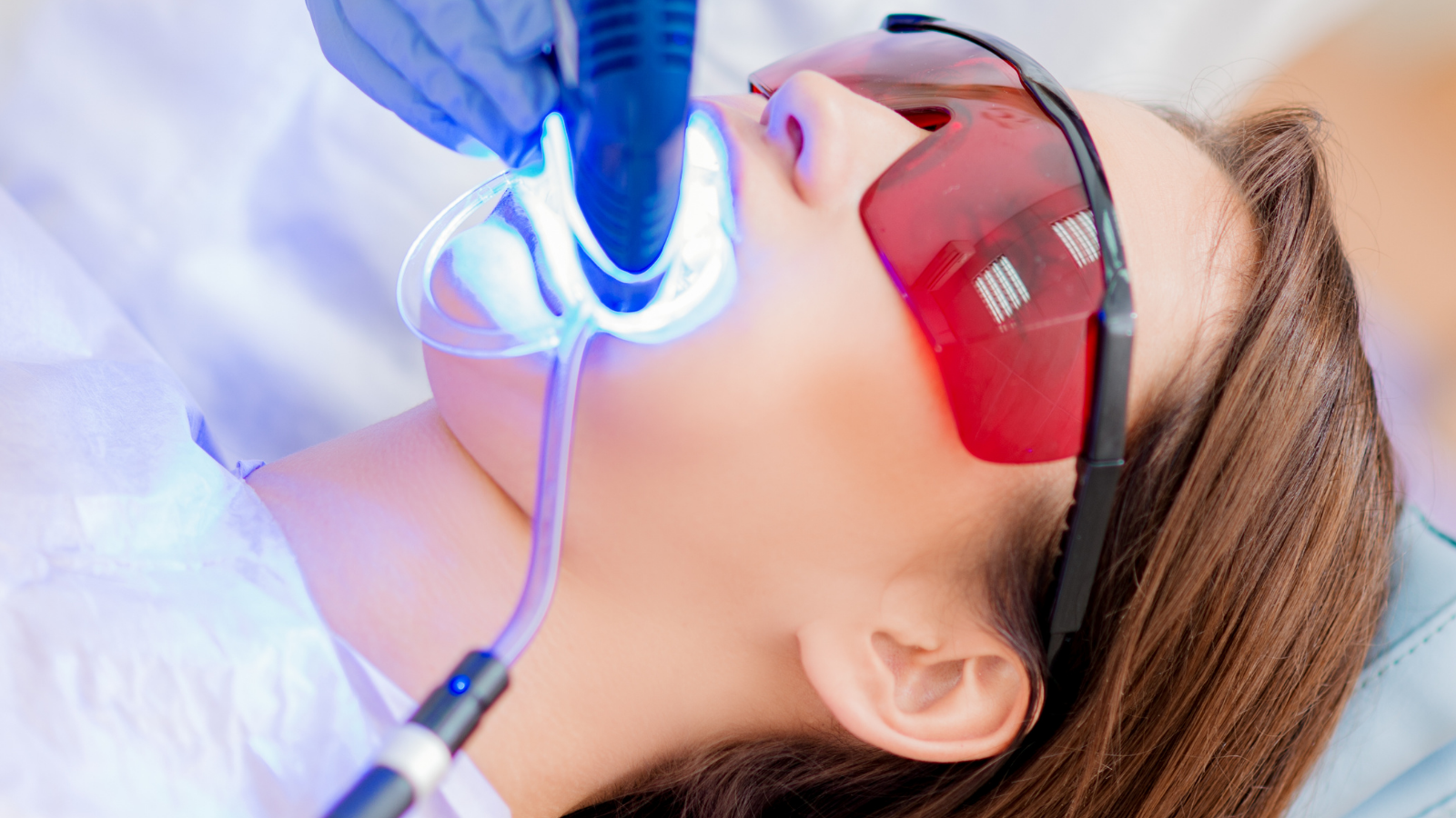 woman getting teeth whitened