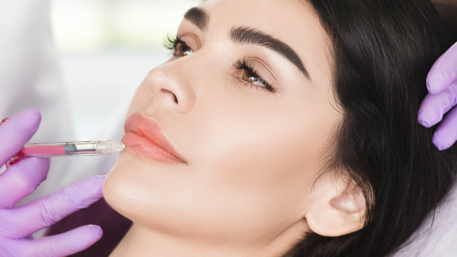 woman getting lip injection