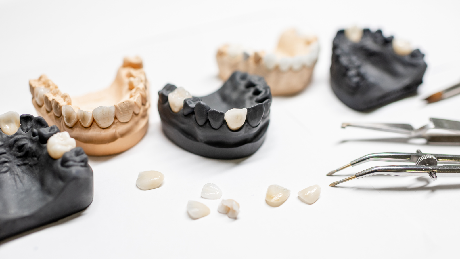 veneers and molds sitting on table