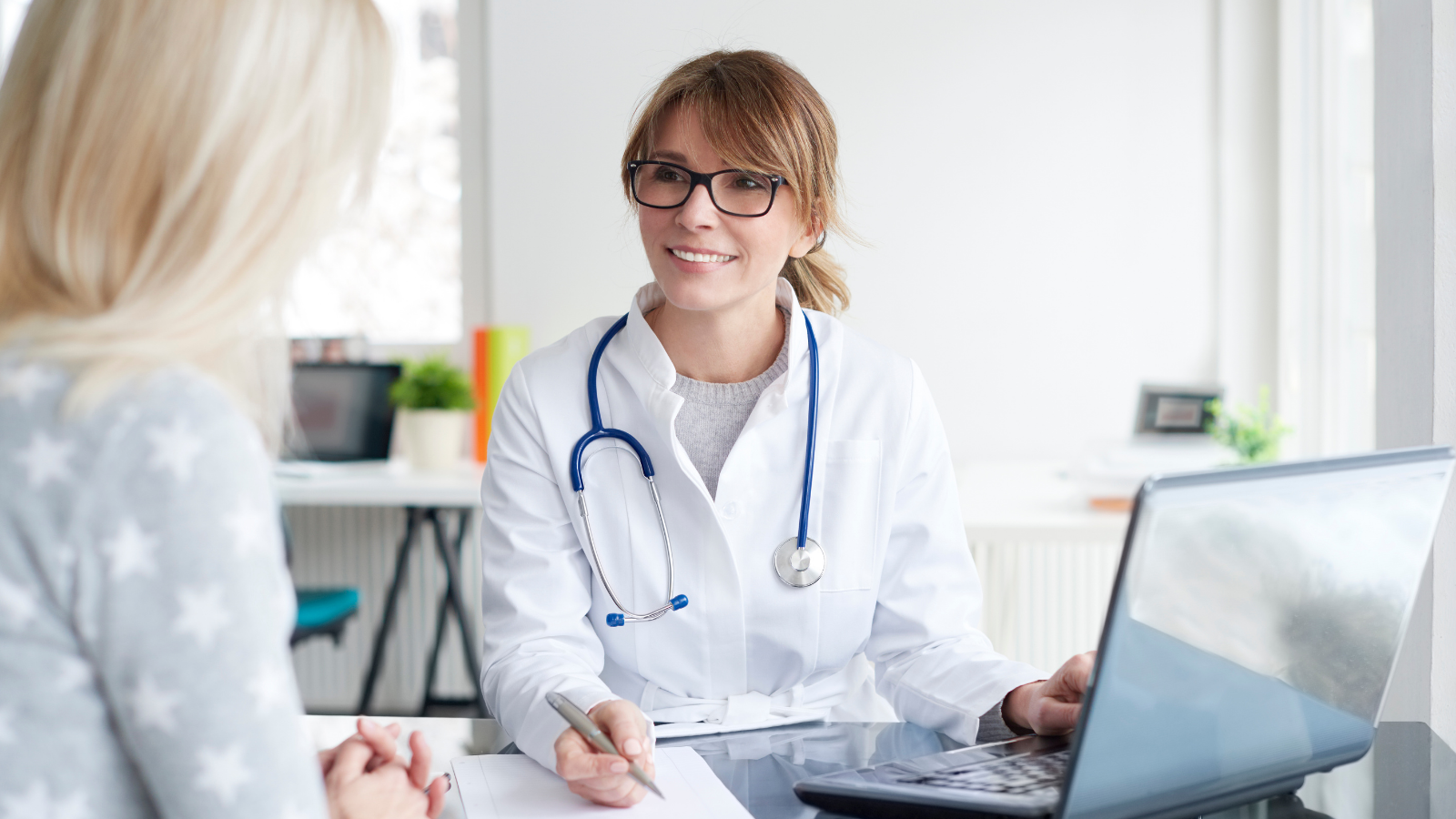 doctor talking with patient