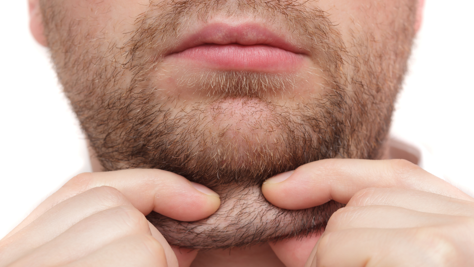 man holding his double chin