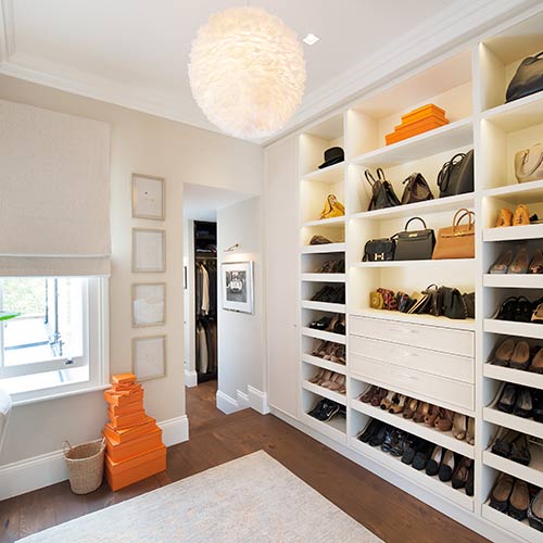 Shoes and bags on wall shelving
