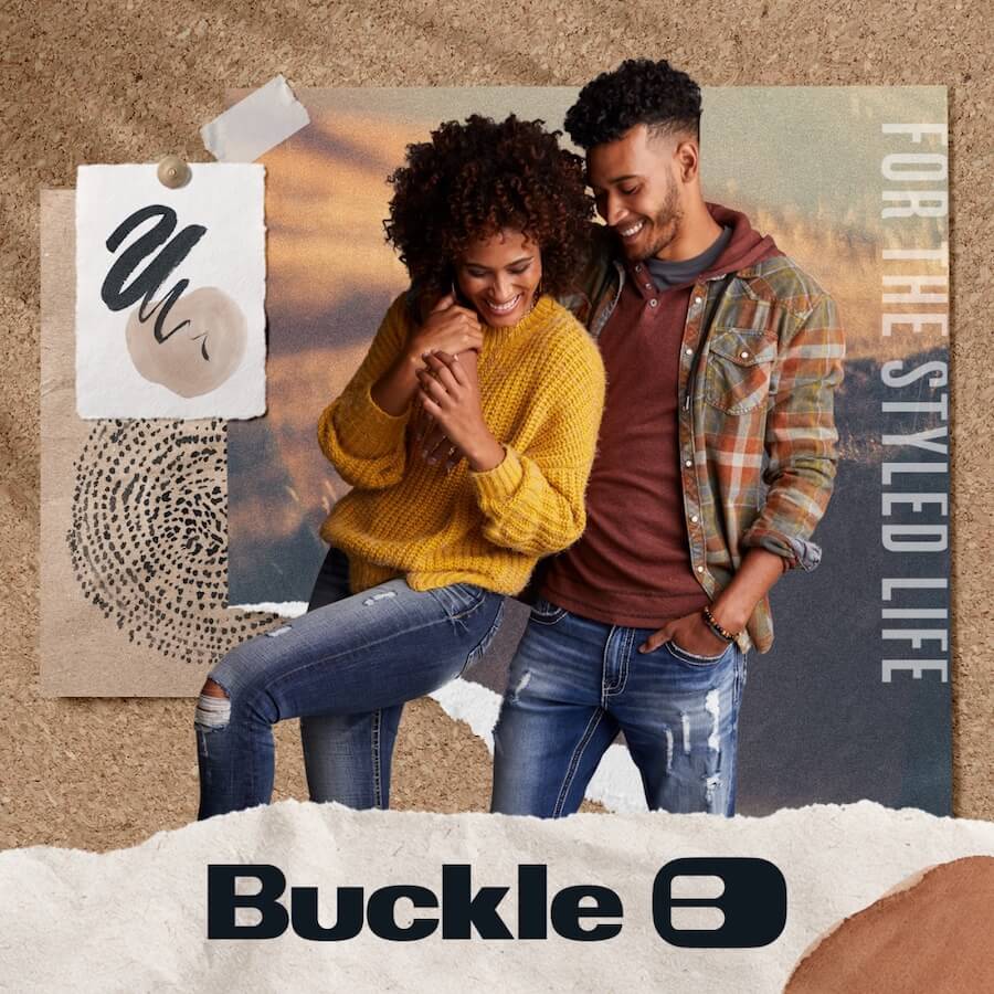 Couple embracing while wearing fall clothes