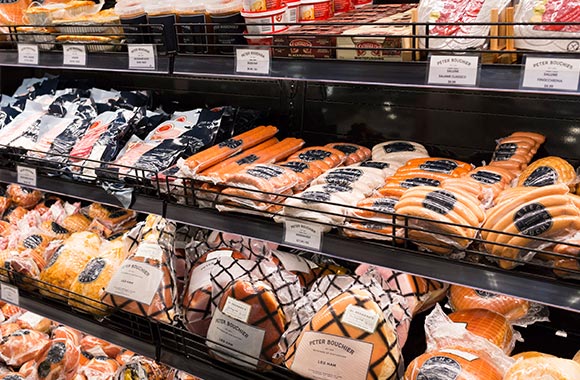 Range of packaged sausages and hams