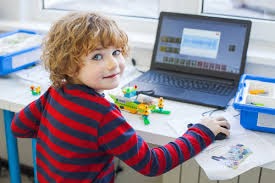 student operating a laptop