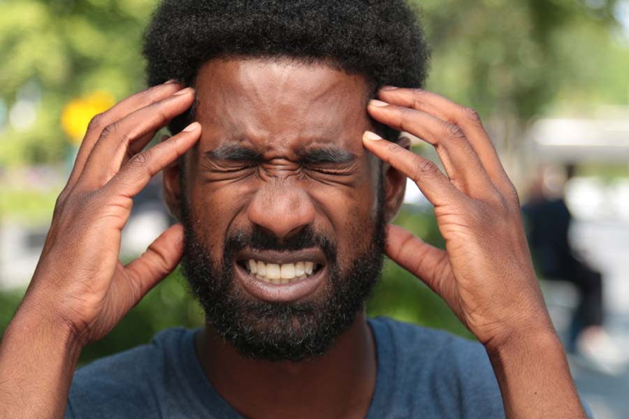 man with severe headache