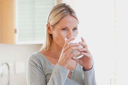 girl drinking alkaline water