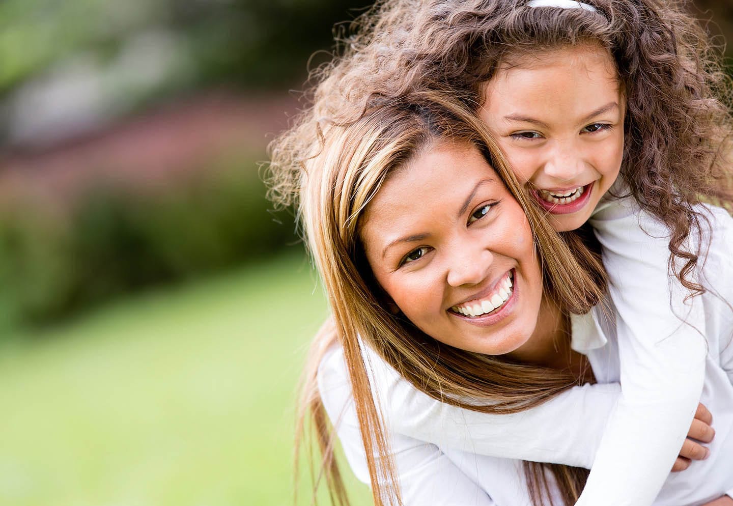 mother and daughter outside