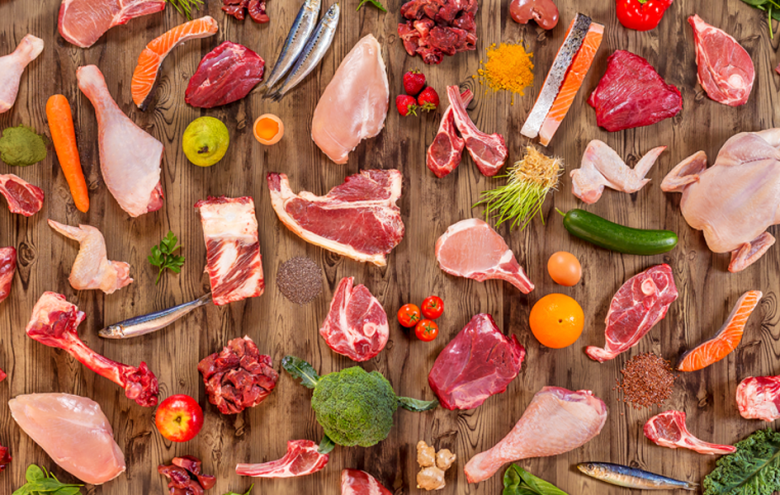 Ingredients of a species appropriate diet for a dog include muscle meat, bones and offal form different animals, fruit and veggies.
