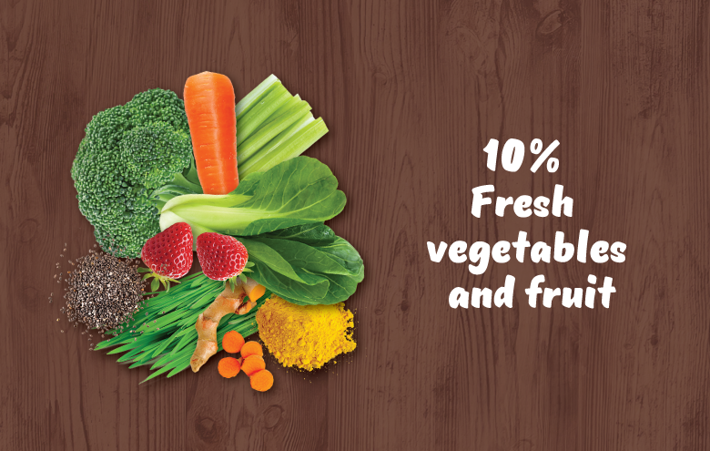 Vegetable and fruits on a wooden background and copy saying that 10 % of fresh vegetables and fruit are part of a complete and balanced raw food diet.