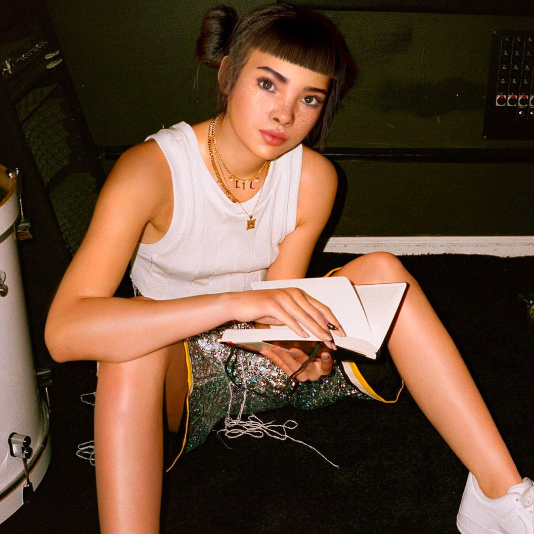Lil Miquela writes "speak up"