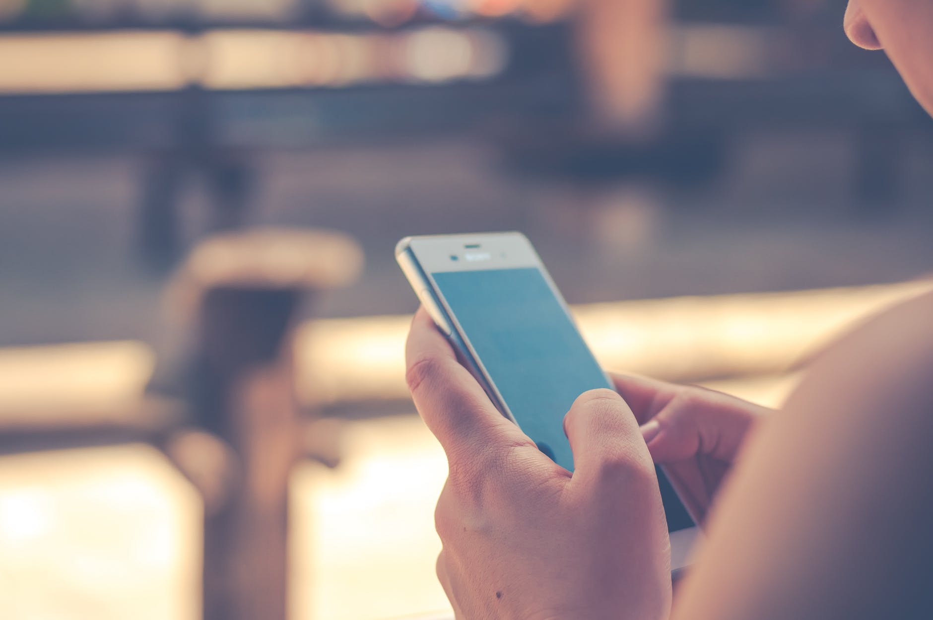 Woman using mobile app on phone
