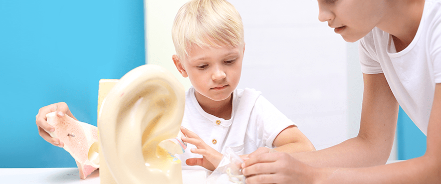 Demonstration of a type of hearing evaluation called play audiometry.