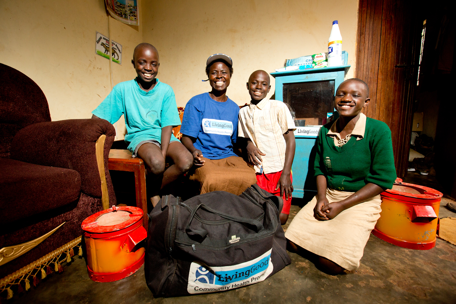 Grace with her kids inside her home.