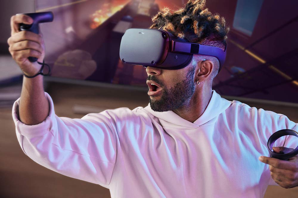 A person playing VR with the Oculus Quest.