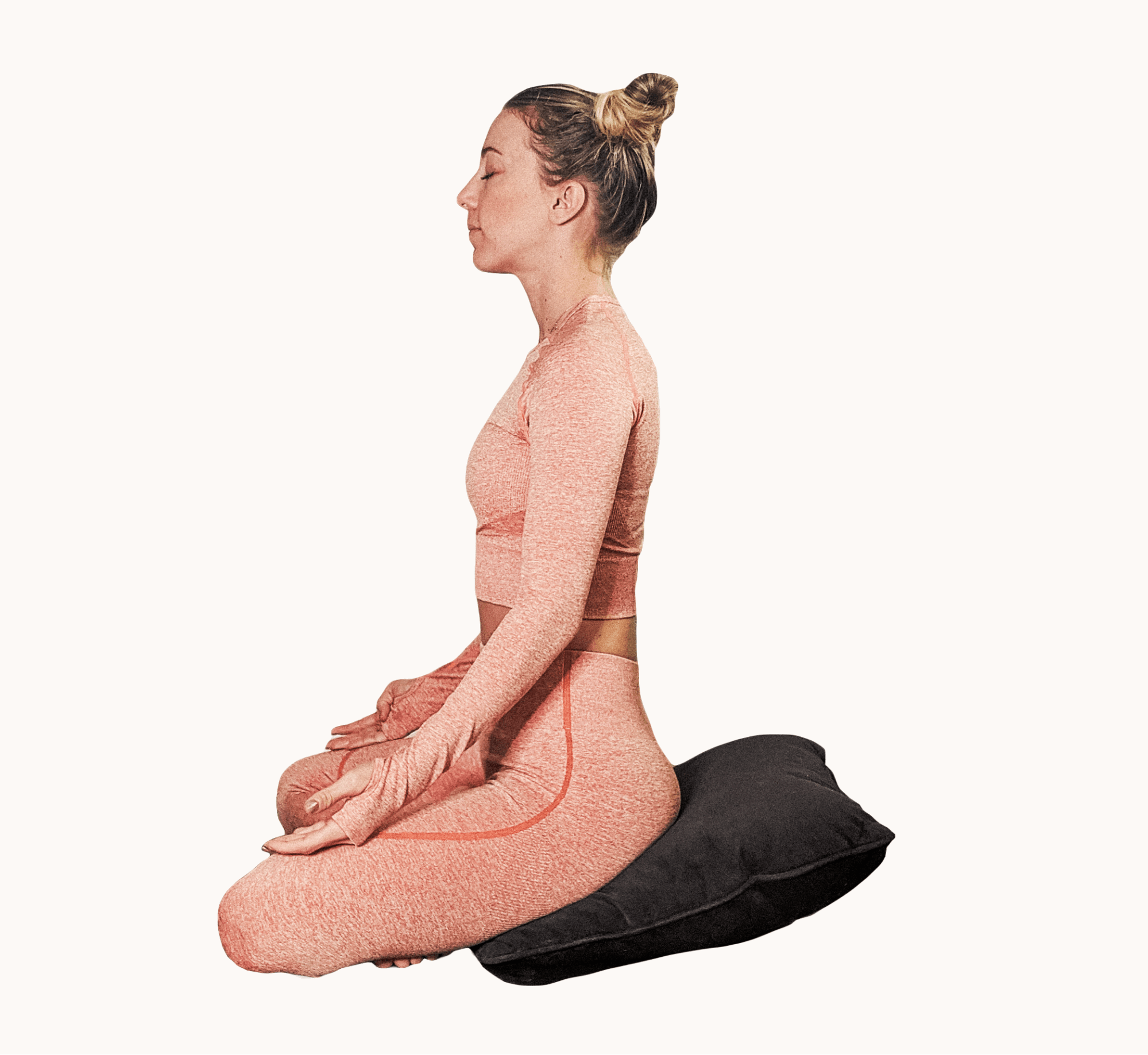 SEATED ON A PILLOW. Sit cross-legged and make sure your hips are elevated on a pillow - ideally allowing your hips to be slightly higher than your knees.
