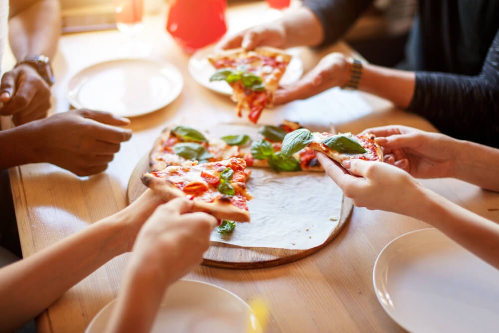 friends eating Pizza Hut pizza