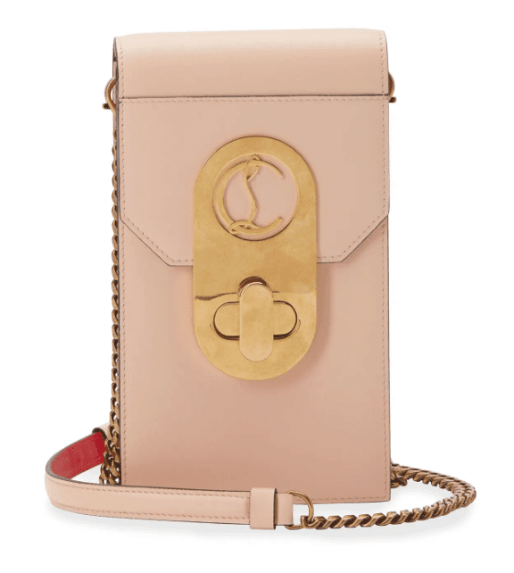Blush colored phone case with gold shoulder chain
