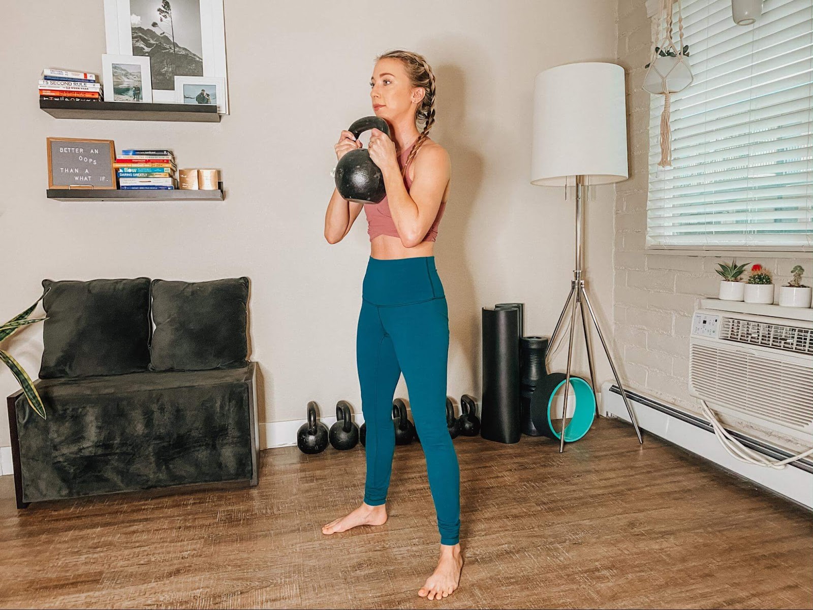Woman performing a reverse lunge with rotation