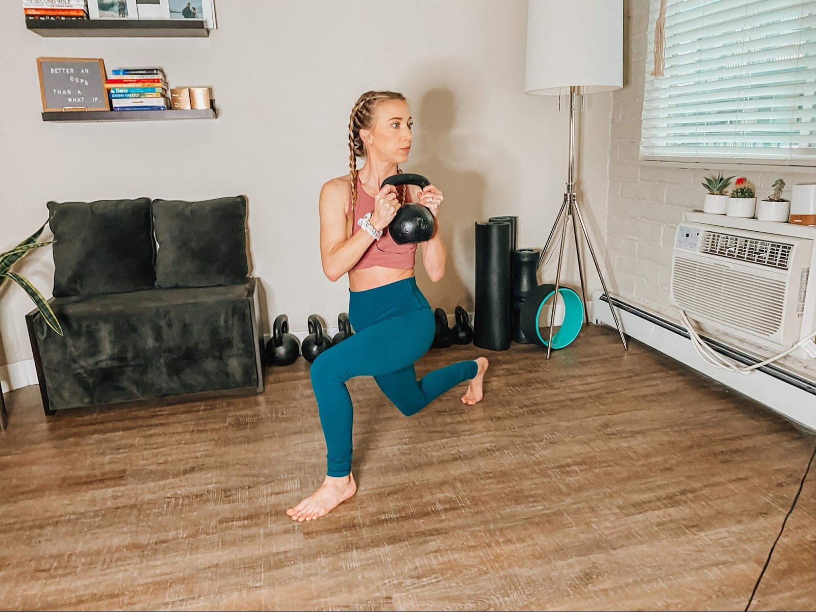 Woman performing a reverse lunge with rotation