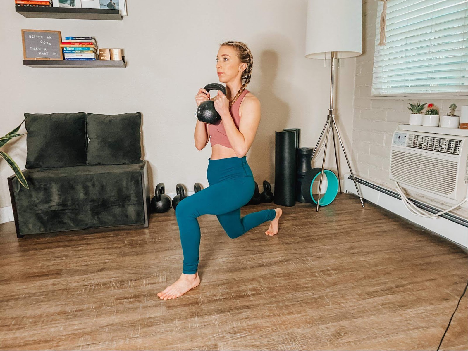 Woman performing a reverse lunge with rotation