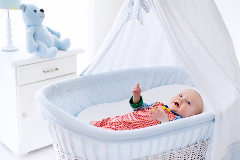 Baby in bassinet.