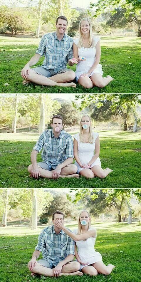 Man and woman blowing blue and pink gum