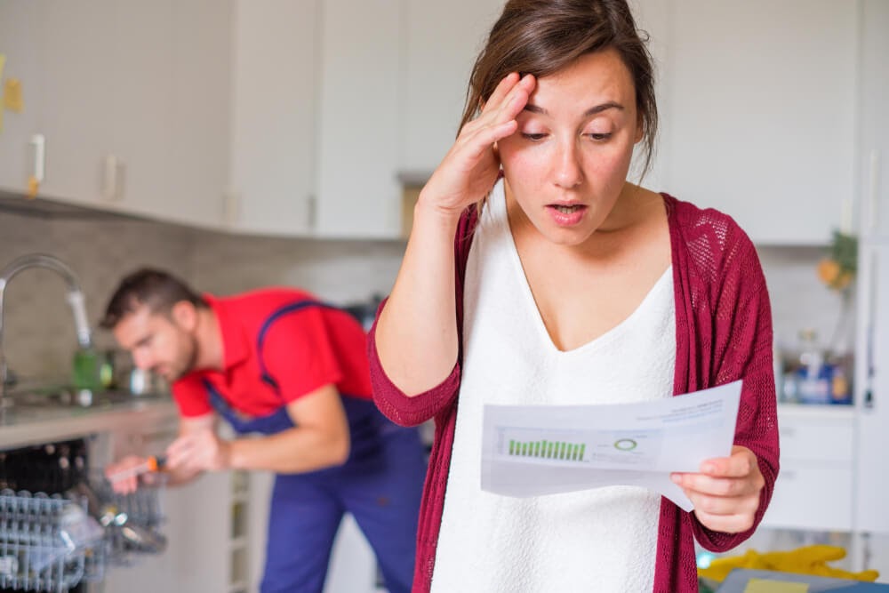 Woman looking aghast at her repair bill
