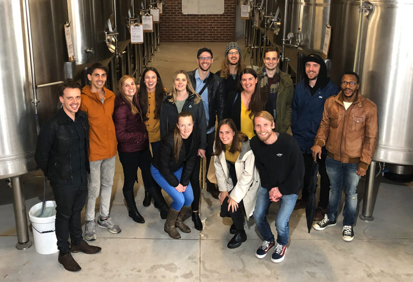 A team group photo on an outing to local brewery Woodstock Brewery.
