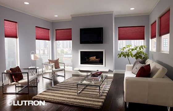 A living space with red blinds on the windows