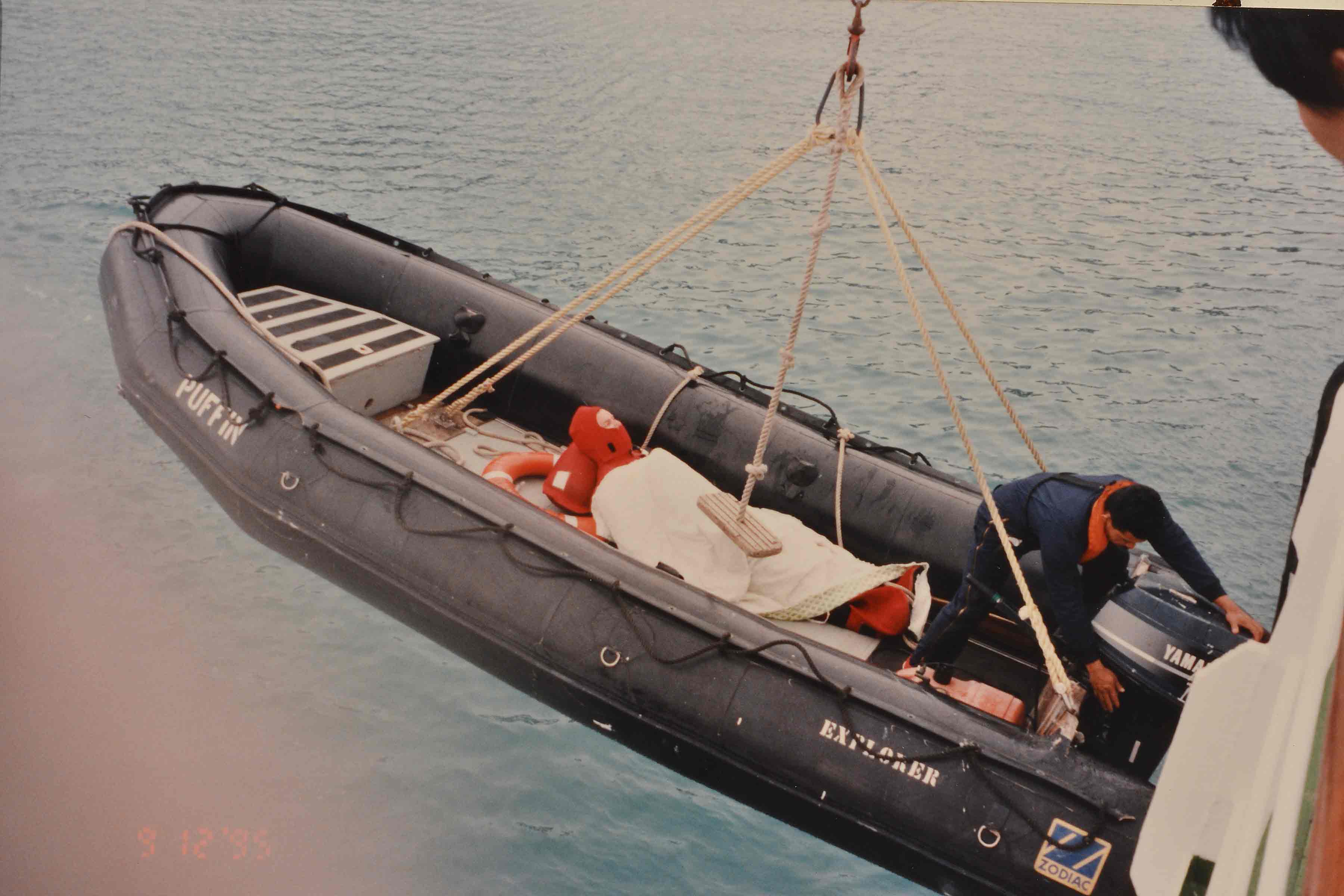 Dr Rod rescued in a boat