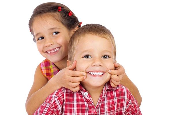 Children showing teeth